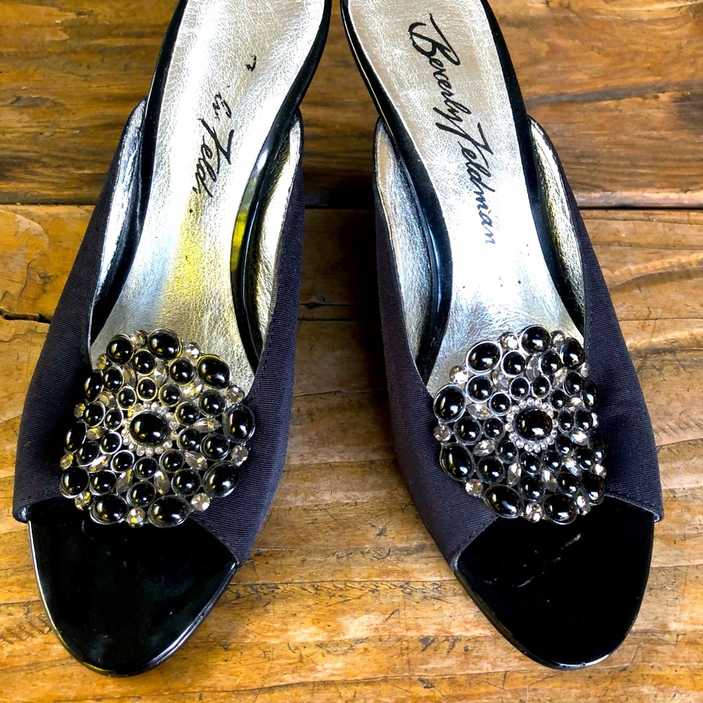 Beverly Feldman slingback wedge with glass and metal flower. Lacquered base.